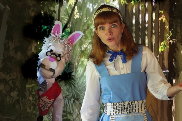 Alice and the March Hare in a garden.