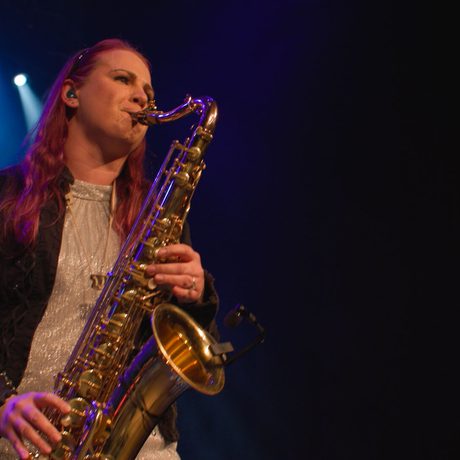 A person playing a saxophone