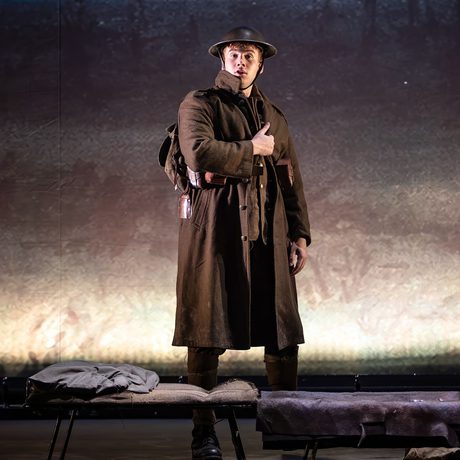 A performer dressed as a World War 2 soldier stood.