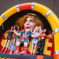 A person dressed as a human jukebox.