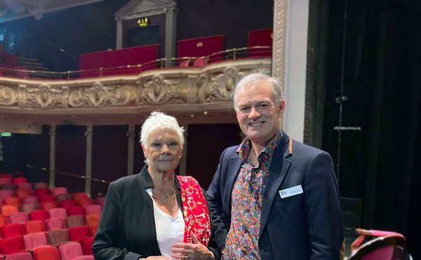 Dame Judi Dench and Deryck Newland on stage at Theatre Royal Winchester