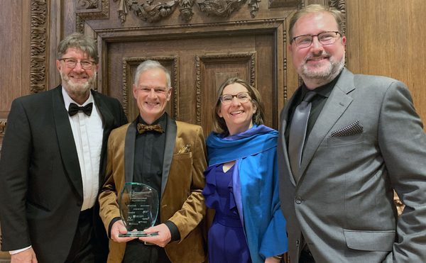 Play to the Crowd team holding a Winchester Business Excellence Award