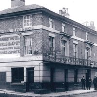 A black and white image of the Market Hotel from 1850-1912, now Theatre Royal Winchester.