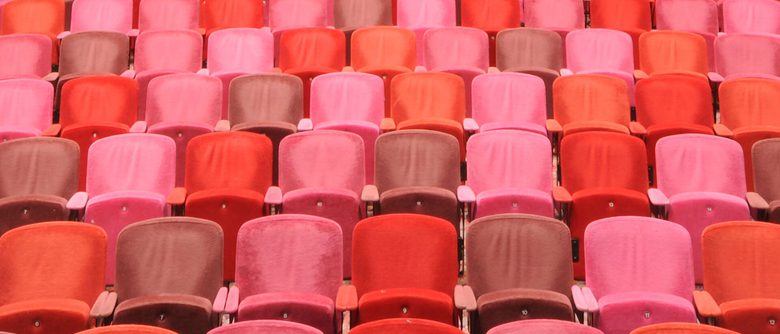 Rows of theatre seats.
