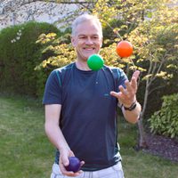 Deryck Newland, Chief Executive and Artistic Director, juggling coloured balls