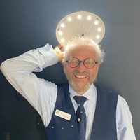 Desmond Webb, Head of Site Development, light blue shirt, navy waistcoat, navy tie, glasses