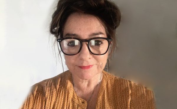 Lorraine Cheshire, Board member, yellow top, glasses