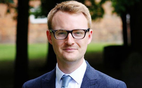 Dr Paul Spencer, Board Member, blue jacket, blue tie, white shirt