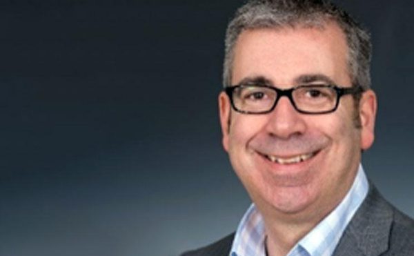 Shaun Stacey, Board Member, grey blazer, glasses