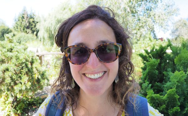 Valerie Skaf, People and Policies Manager, yellow top, sunglasses