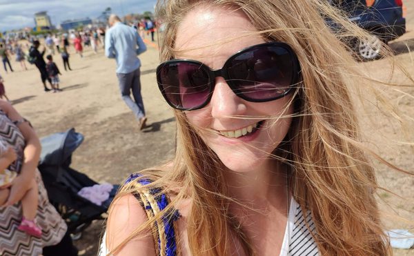 Victoria Burt, Press and Communications Officer, sunglasses