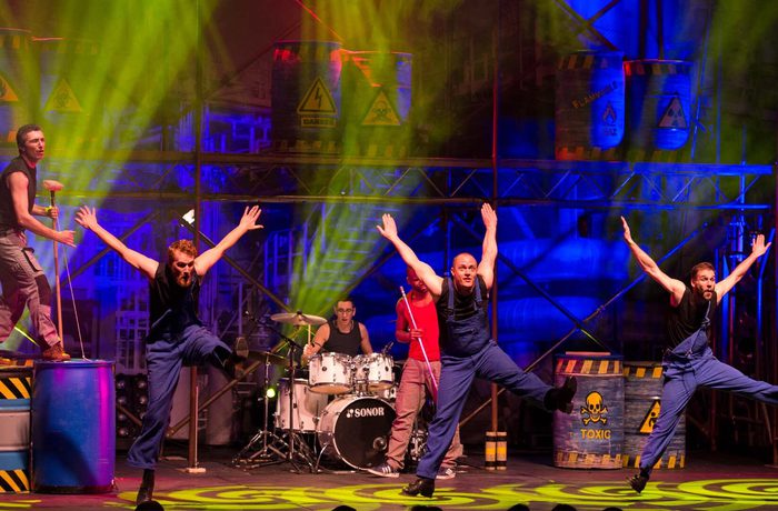 Tap performers on stage dancing